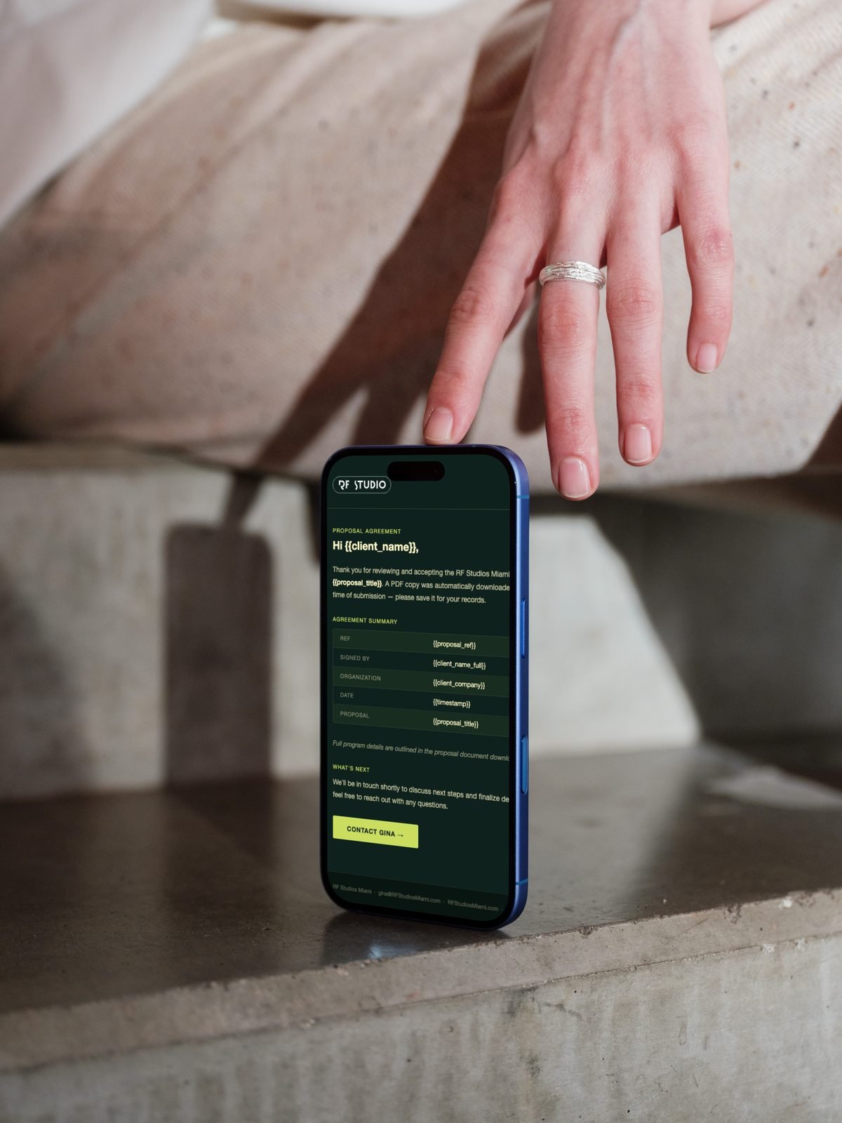RF Studios confirmation email on iPhone 16 — proposal agreement template